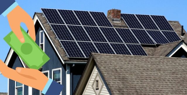 Solar panels on a house roof with hands holding cash, representing solar incentives for homeowners.